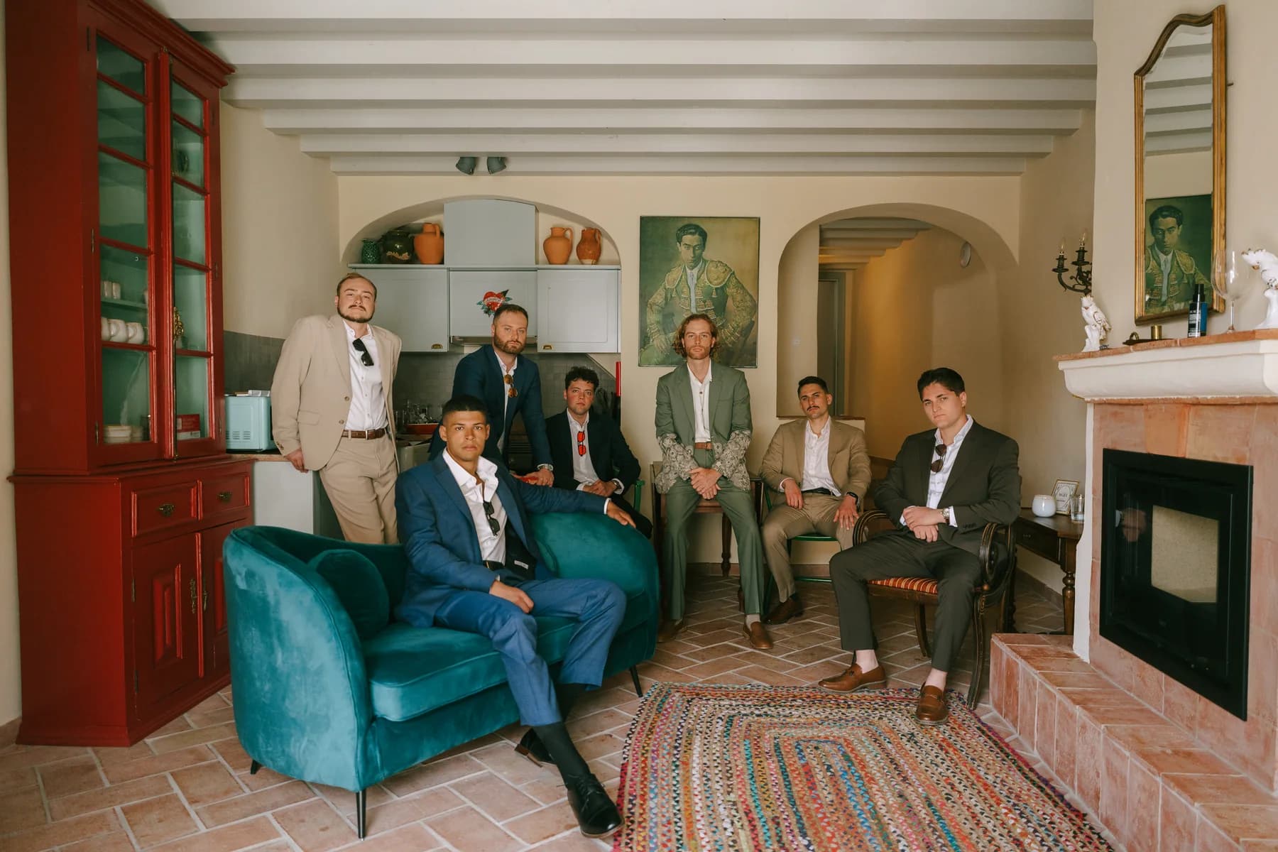 The groom and wedding party in a sitting room