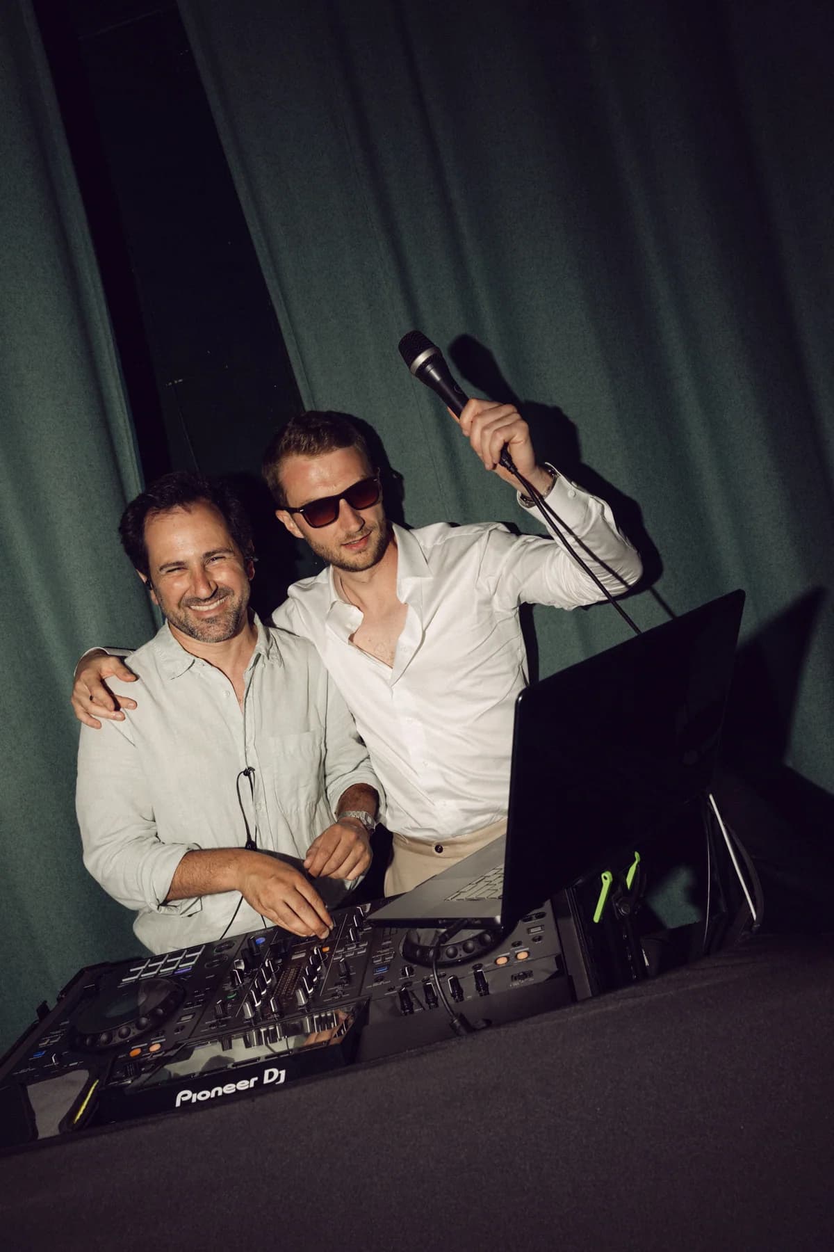 Two guests at the DJ decks