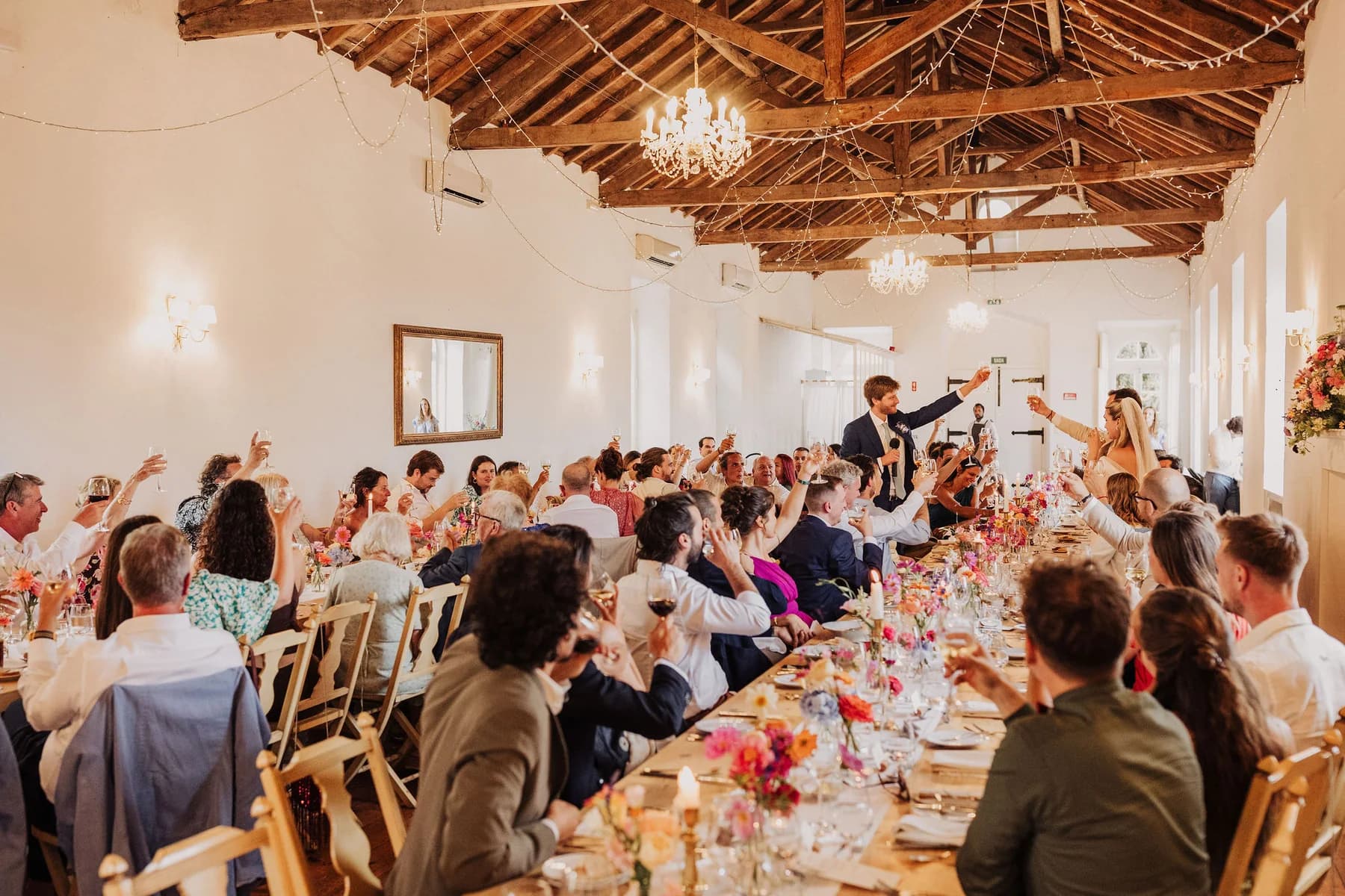 Guests celebrating over dinner in the dining hall