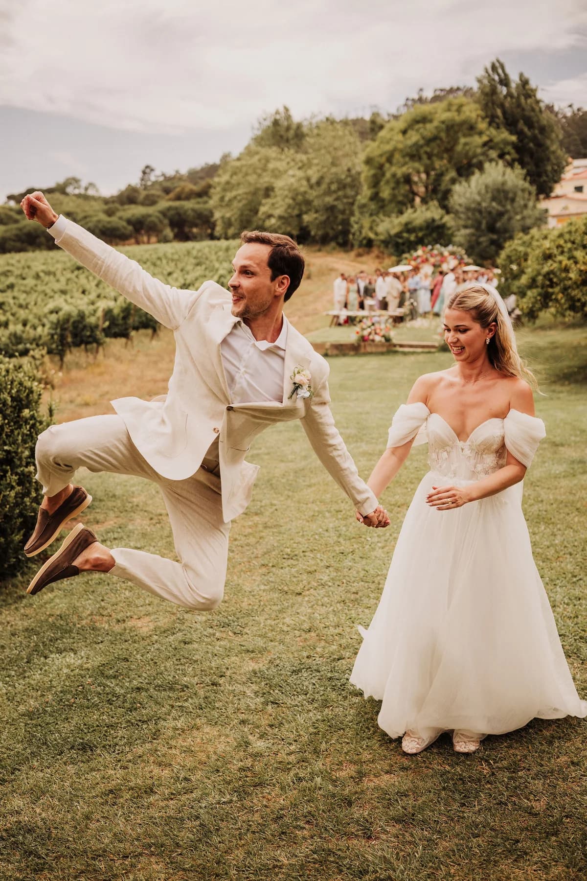 Newlyweds celebrating together on the lawn