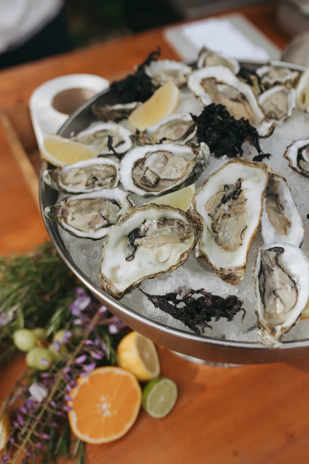 Fresh oysters served on ice with citrus