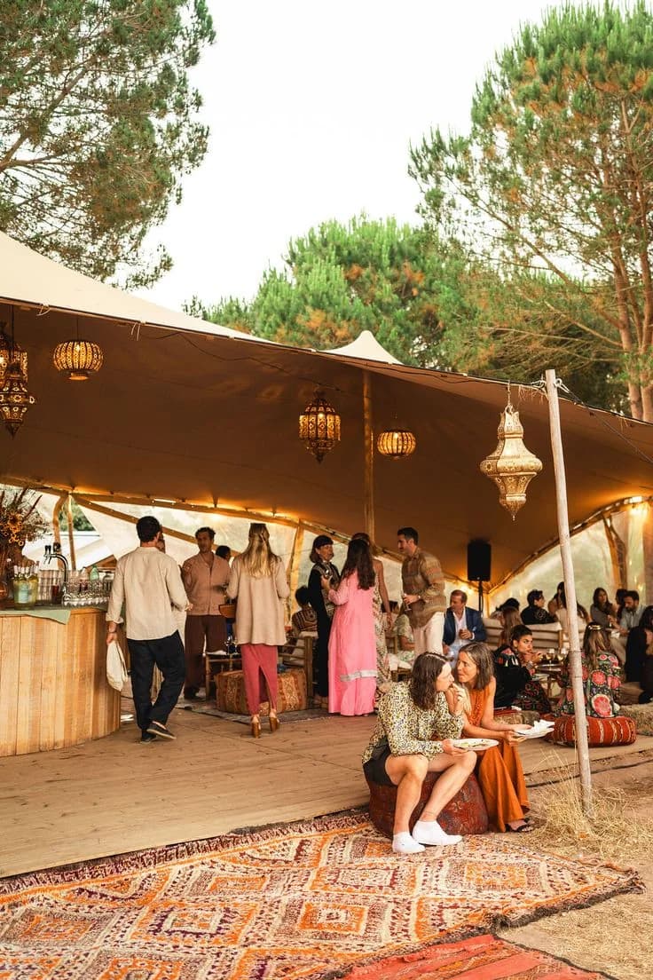 Guests gathered beneath the welcome dinner tent