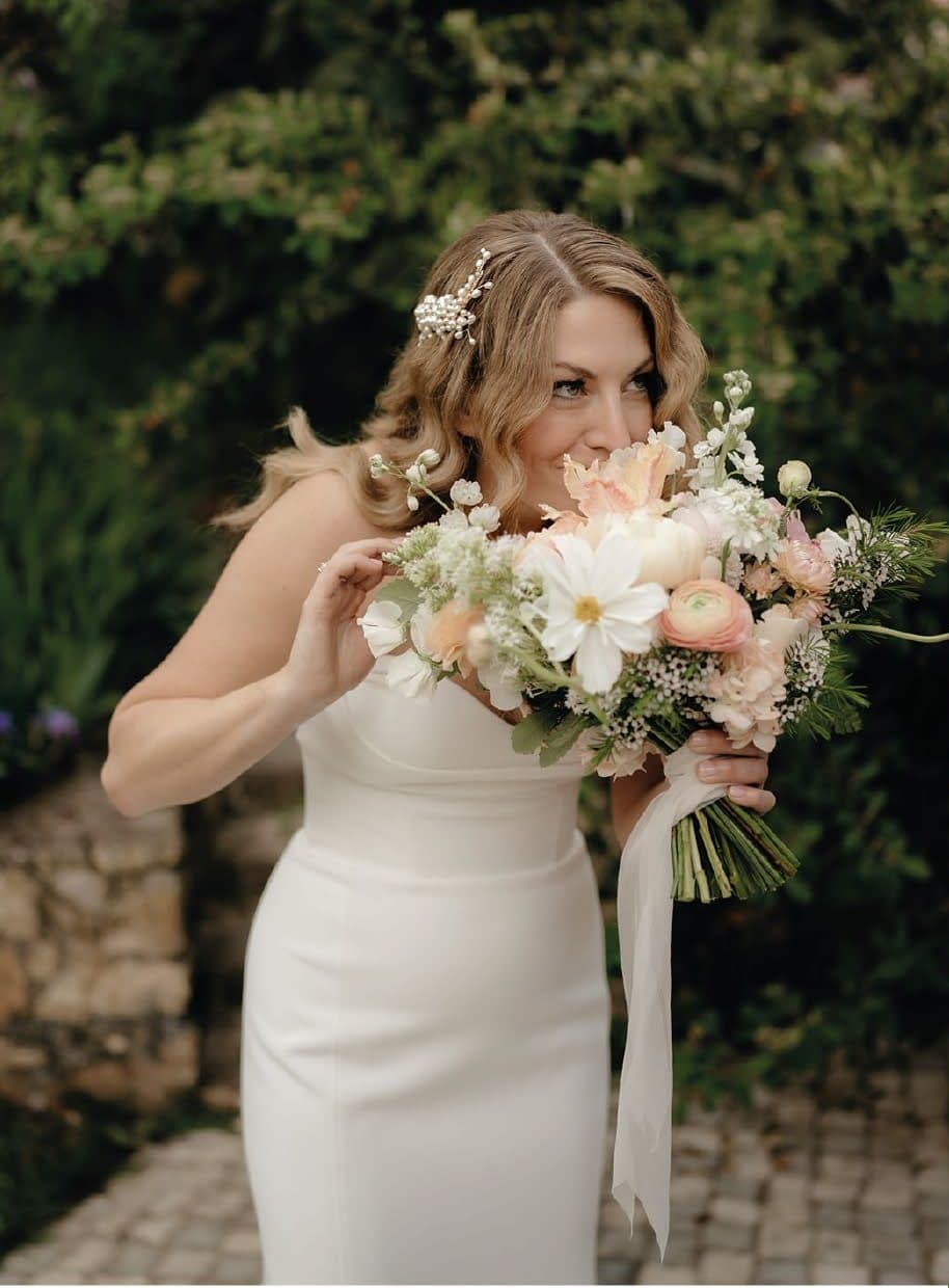 Bride holding a seasonal bouquet