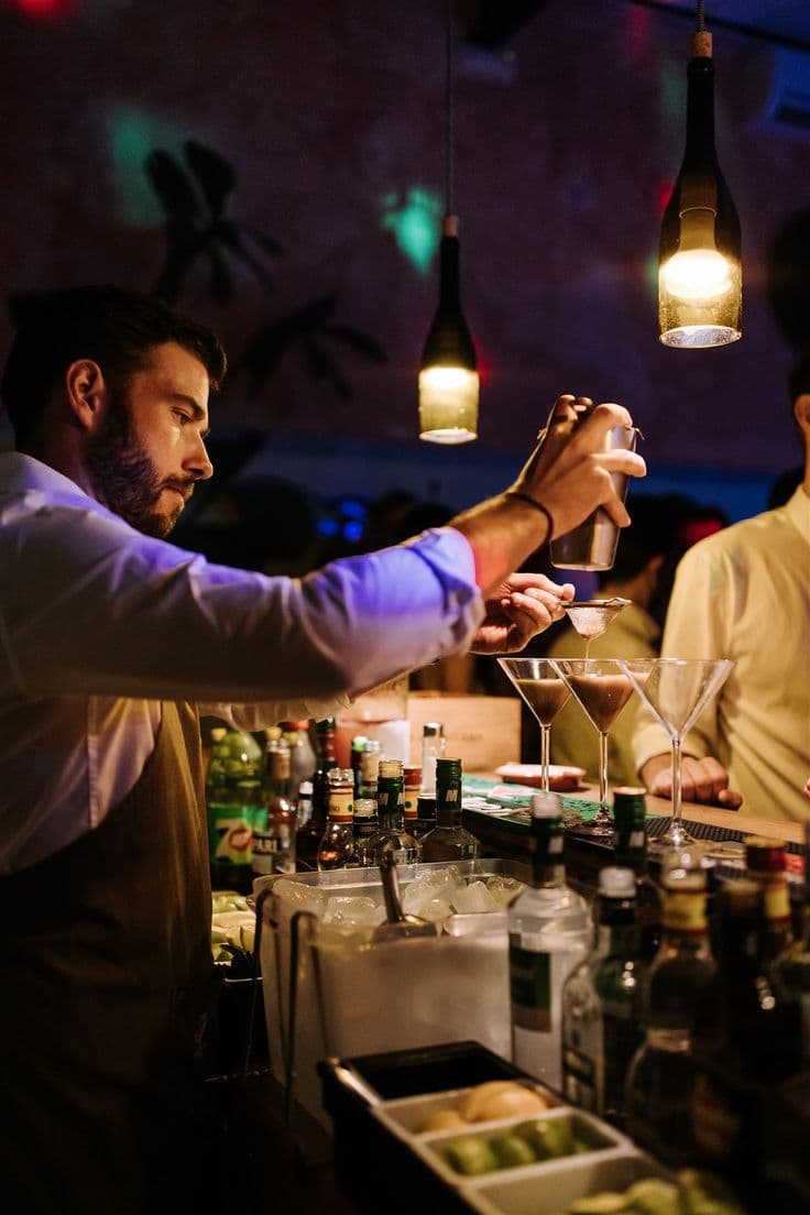 Bartender shaking cocktails at the Bar Dona Rosa