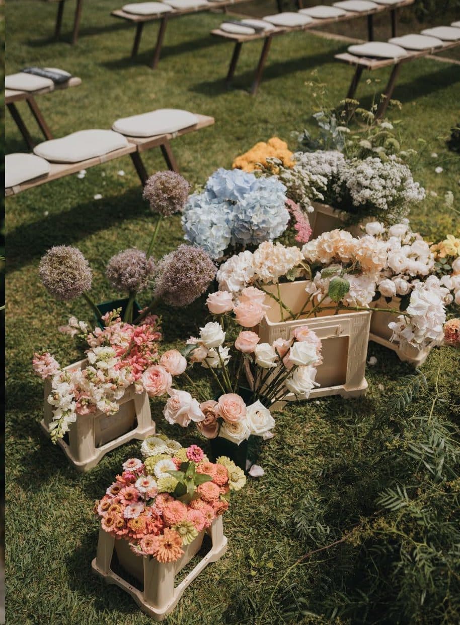 Flowers lining the ceremony aisle